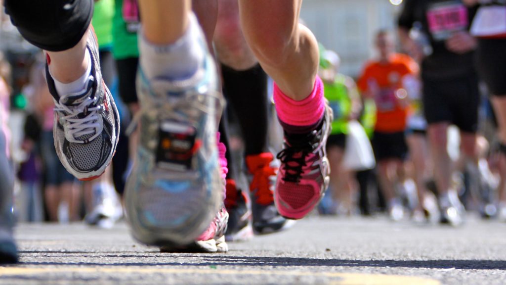 Street-level photo of runners in a marathon