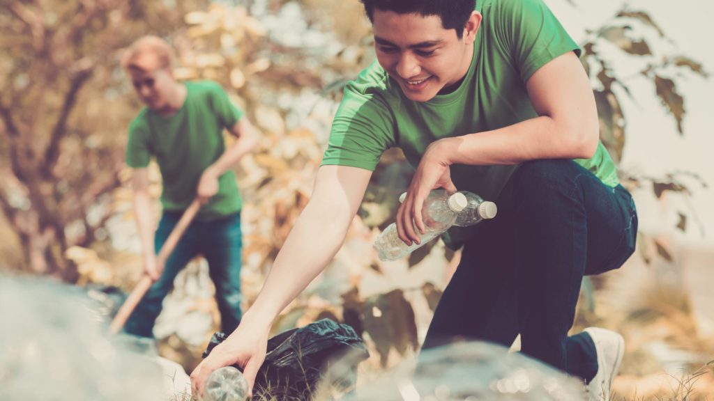 People cleaning up a park